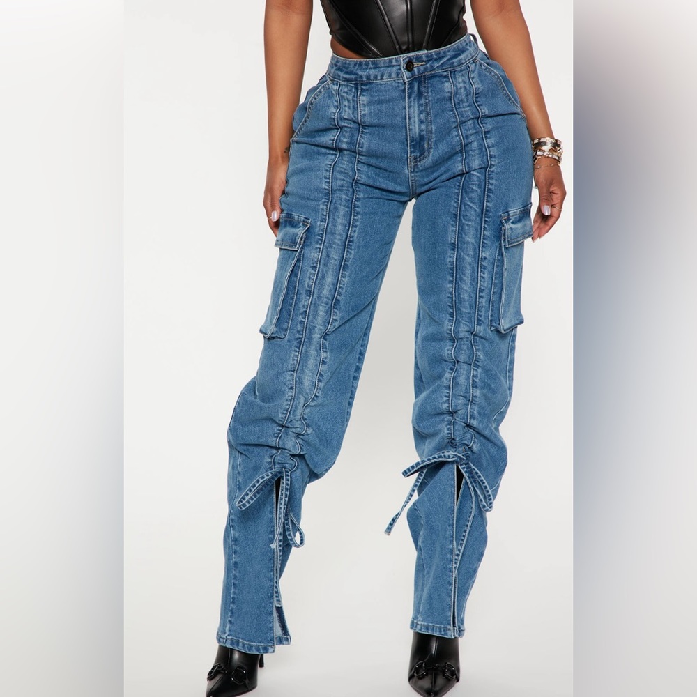 Baggy Cargo Jeans with slit in the front . Hugs body and very stretchy.
